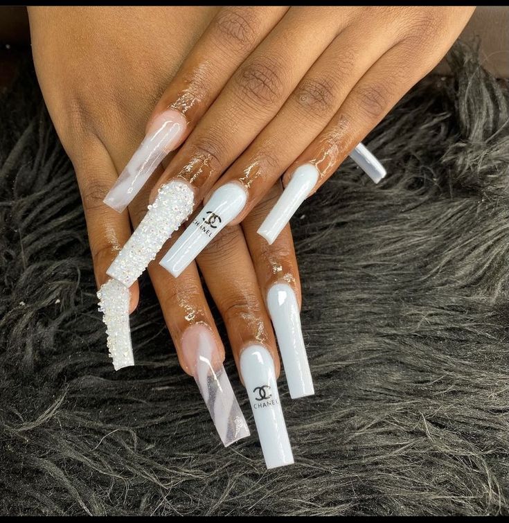 Chic Long Nails with Glossy Textures and Sparkling Embellishments