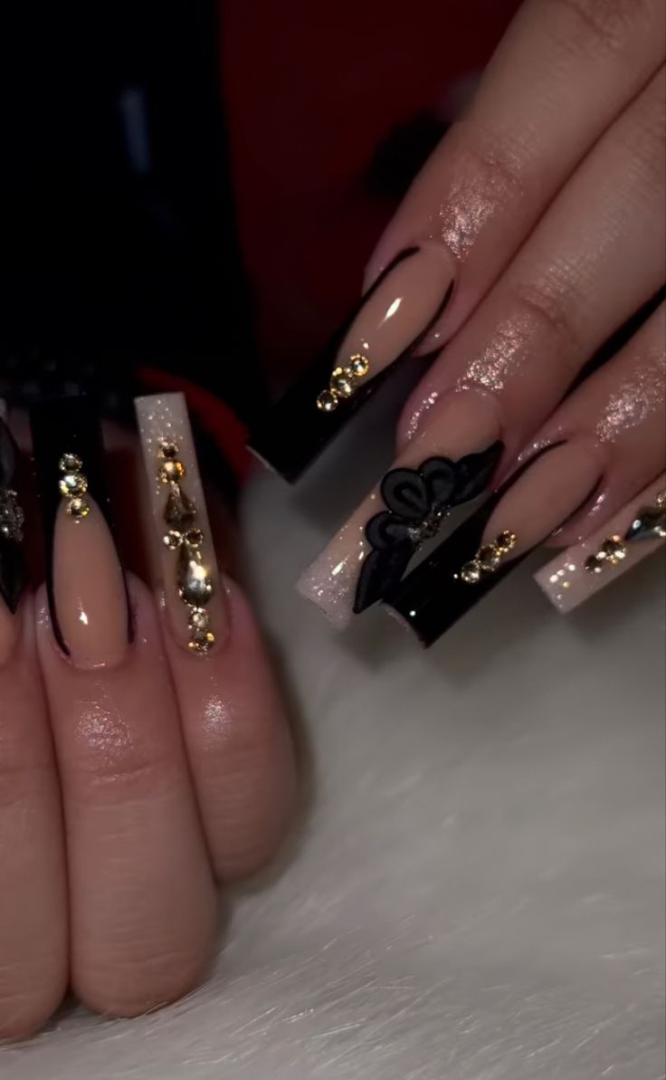 Sophisticated Stiletto Nail Design with Glamorous Color and Texture Combination.