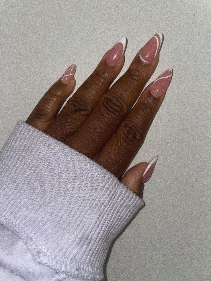 Chic Almond-Shaped Nail Design in Soft Pink and White with Delicate Lines