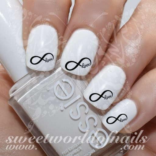 Chic Minimalist White Nail Design with Infinity Symbols and 