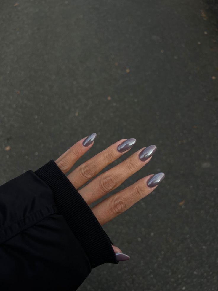 Elegant Gradient Metallic Almond Nails: Trendy Statement Design.