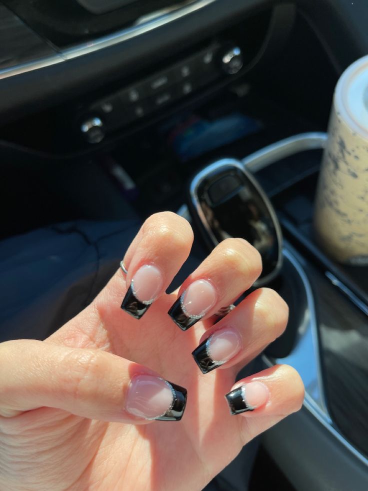 Elegant Black French Tips Nail Design: A Versatile Touch of Sophistication.