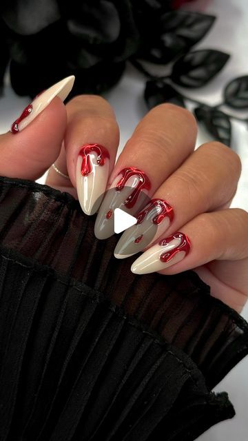 Bold Almond-Shaped Nail Design: Creamy Beige and Dramatic Deep Red Elegance.