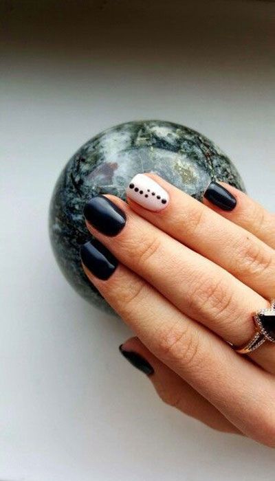 Sophisticated Glossy Black Nail Design with Chic Matte Pink Accent and Minimalist Dots