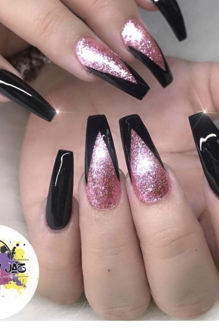 Chic Black and Pink Angular Nail Design with Glamorous Glitter Accents.