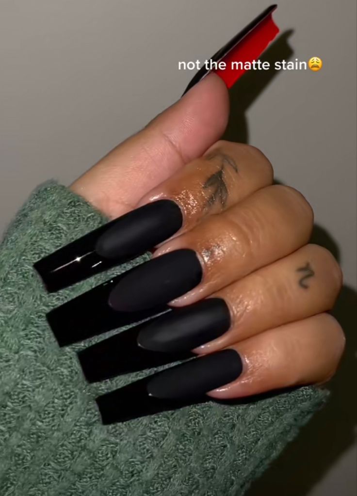 Modern Edgy Nail Design: Bold Matte and Glossy Black Contrast on Long Square Nails.