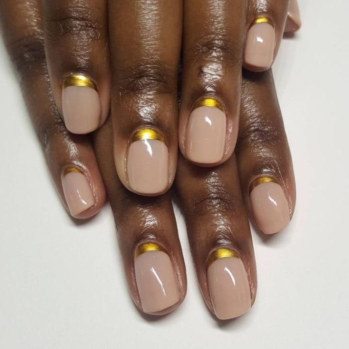 Chic Nude Nail Design with Minimalist Gold Accents for Timeless Elegance.