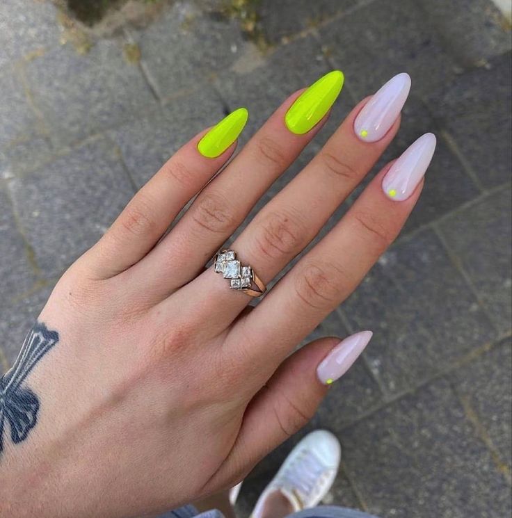 Bold Neon Yellow and Pastel Almond Nail Design with Playful Accent Dots.