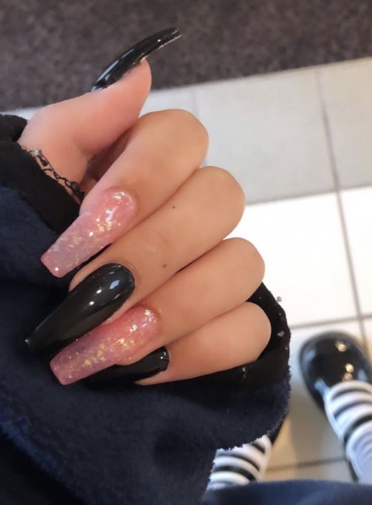 Trendy Nail Design: Elongated Black and Glittery Pink Combination for Fashionable Occasions