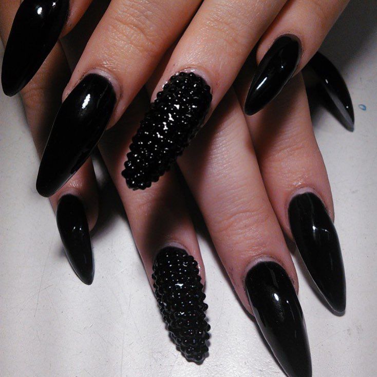 Bold Elegant Black Nail Design with Textured Beaded Accent