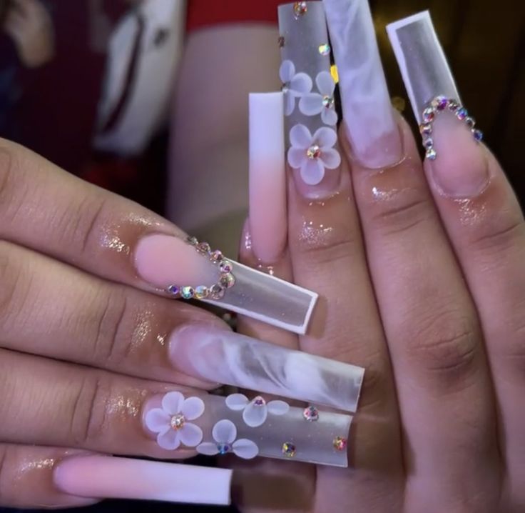 Elegant Long Acrylic Nails: Translucent Marble, Soft Pink, Floral Designs, and Gemstones for a Dreamy Aesthetic.