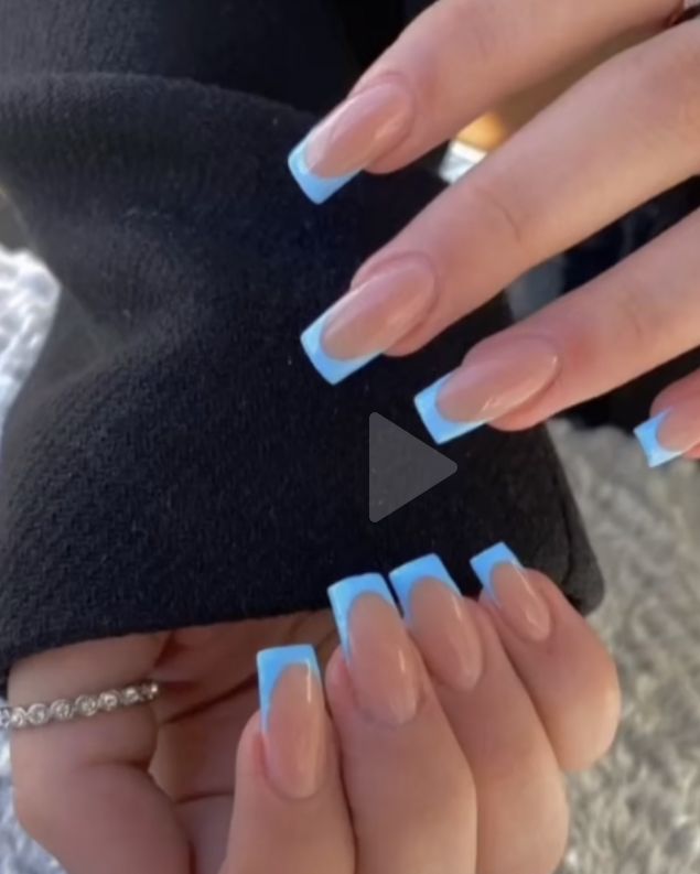 Chic French Tip Nail Design with Soft Baby Blue Tips on Nude Base.