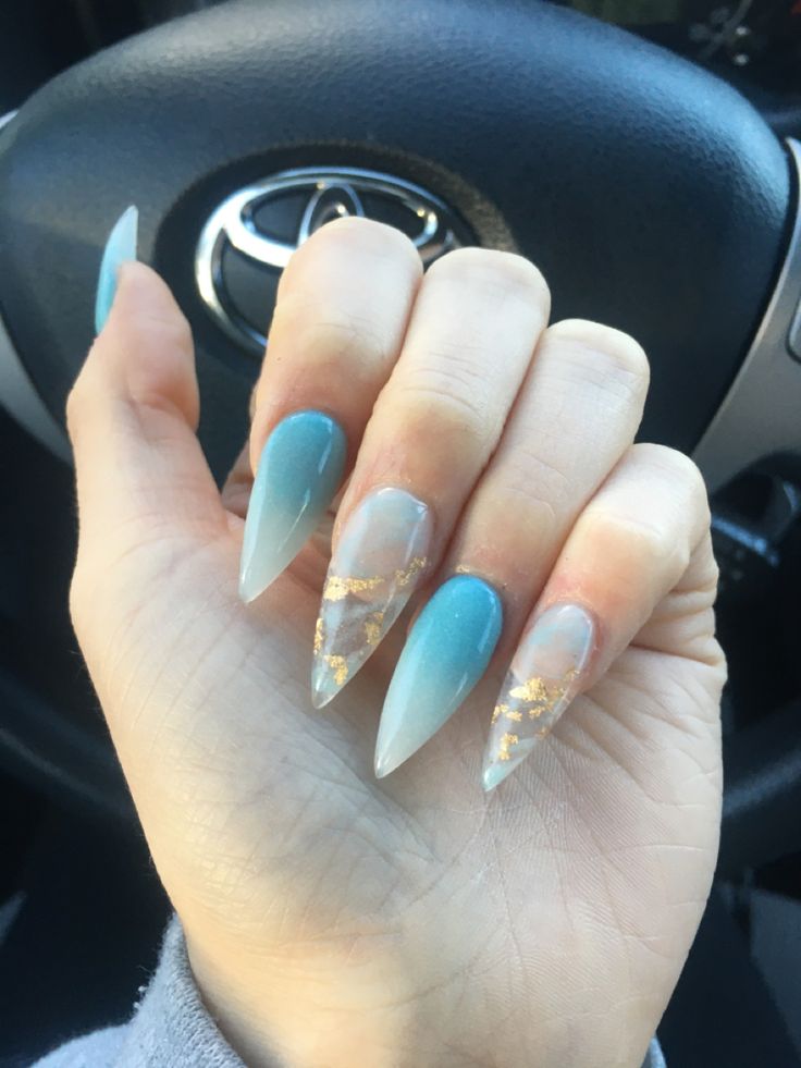 Elegant Ombre Stiletto Nails with Gold Accents for Versatile Glamour.