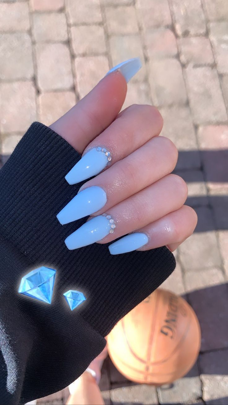 Chic Pastel Blue Coffin Nails with Rhinestone Accents for a Glamorous Look