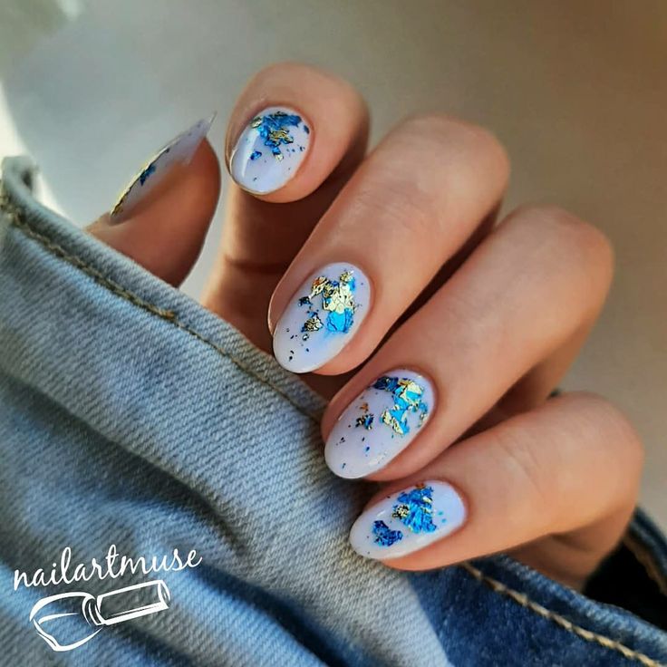 Chic Lavender Nail Design with Vibrant Blue and Gold Foil Accents.