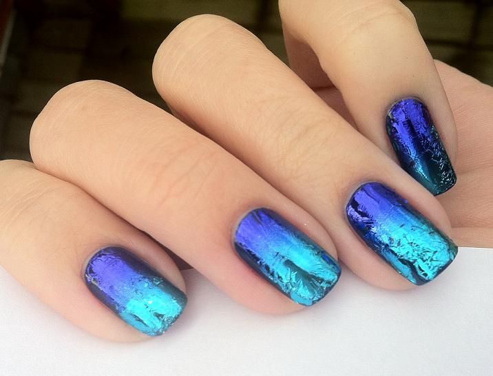 Modern Gradient Nail Design: Striking Blue and Teal Hues with Iridescent Finish