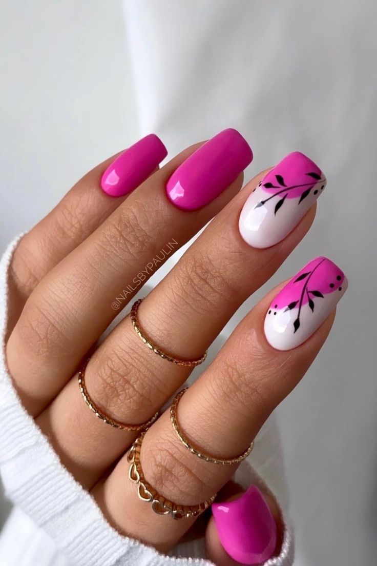 Chic Nail Design: Glossy Hot Pink and Elegant White with Artistic Floral Accents