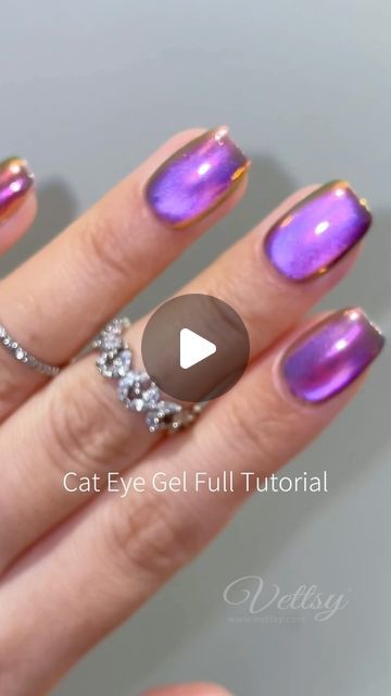 Vibrant Cat Eye Nail Design with Golden Accents and Captivating Elegance.