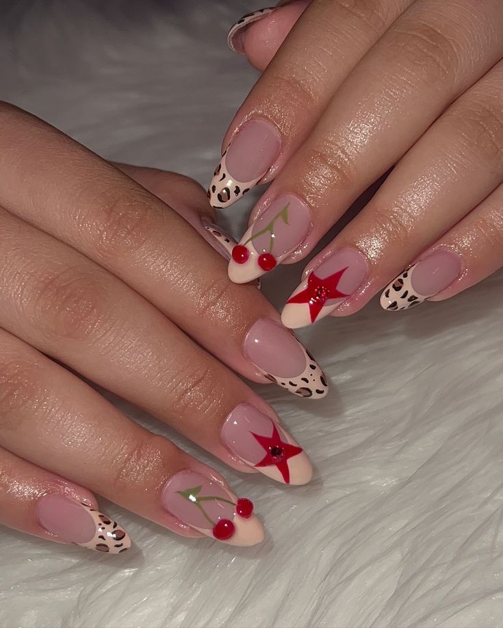 Playful Pastel and Bold Nail Design with Cherry Motifs, Star Accents, and Chic Leopard Print Tips.