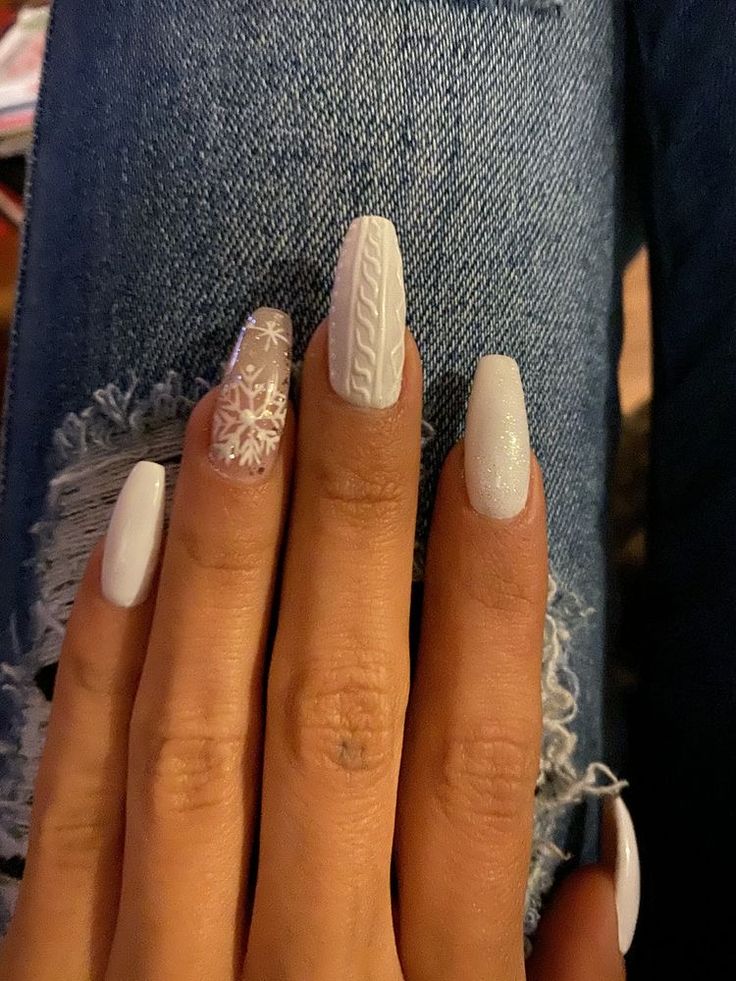 Chic Winter Nail Design: Textured Matte and Glossy White with Festive Knit and Snowflake Accents.