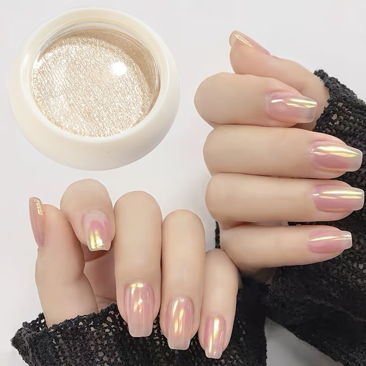 Elegant Iridescent Nail Design: Soft Pink Base with Metallic Gradient Shine