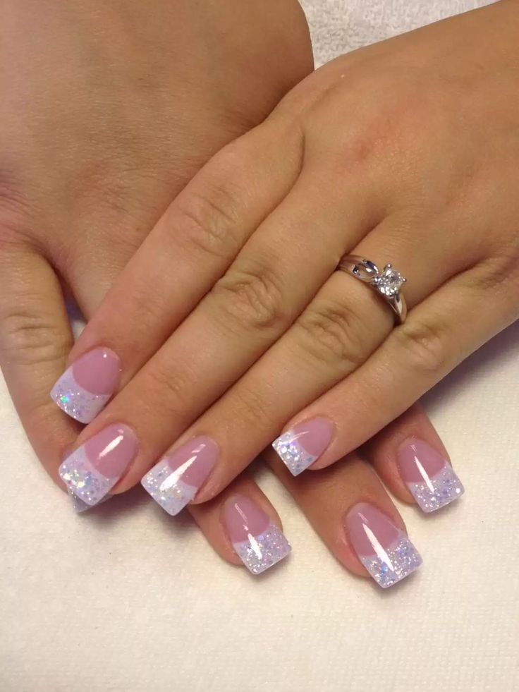 Sophisticated Soft Pink Nail Design with Sparkling French Tips.