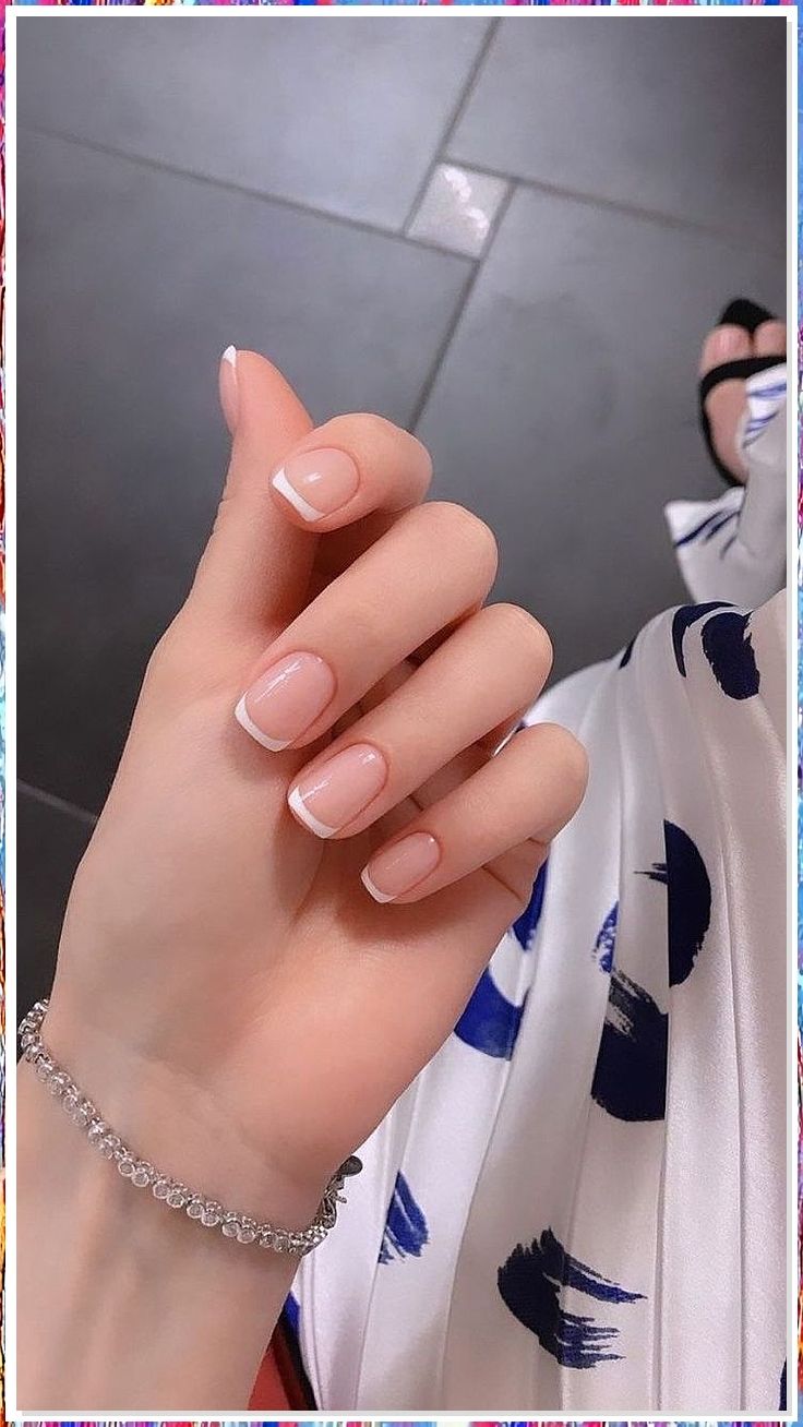 Timeless French Tip Manicure: Elegant Soft Pink Base with Clean White Tips