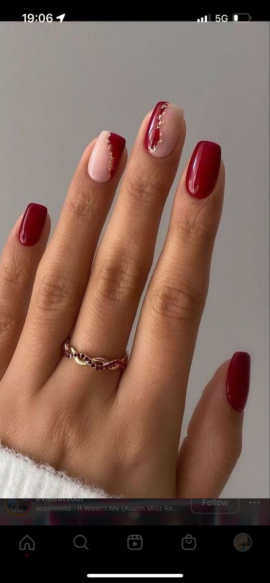 Chic Deep Red and Soft Pink Nail Design with Sophisticated Gold Accent