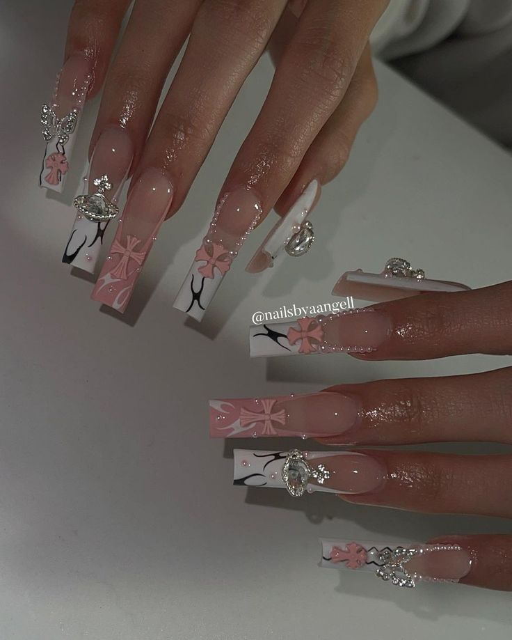 Stylish Long Square Nail Design with Floral Accents and Glamorous Embellishments.