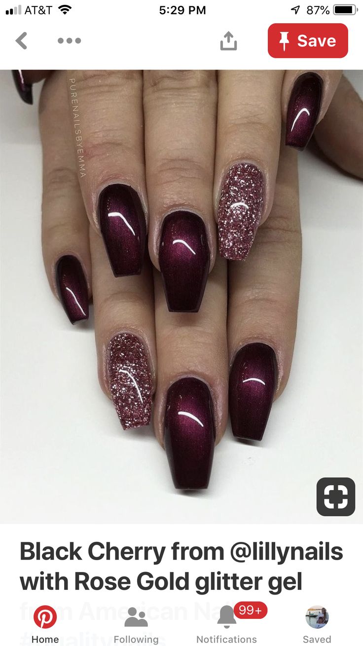 Chic Deep Burgundy Nail Design with Glamorous Rose Gold Glitter Accents.