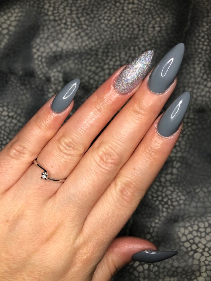 Elegant Almond-Shaped Nail Design with Matte Gray and Glitter Accents