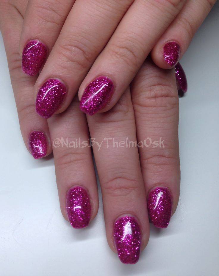 Vibrant Glitter Pink Nail Design: Playful Elegance for Any Occasion.