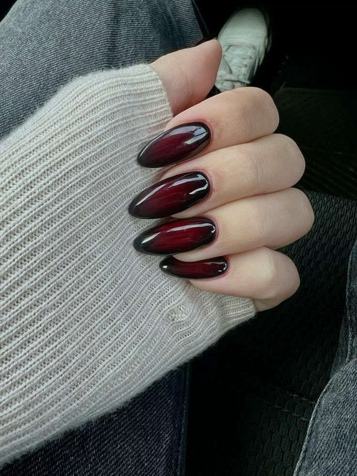 Sophisticated Burgundy Ombre Almond Nails: Perfect for Any Occasion