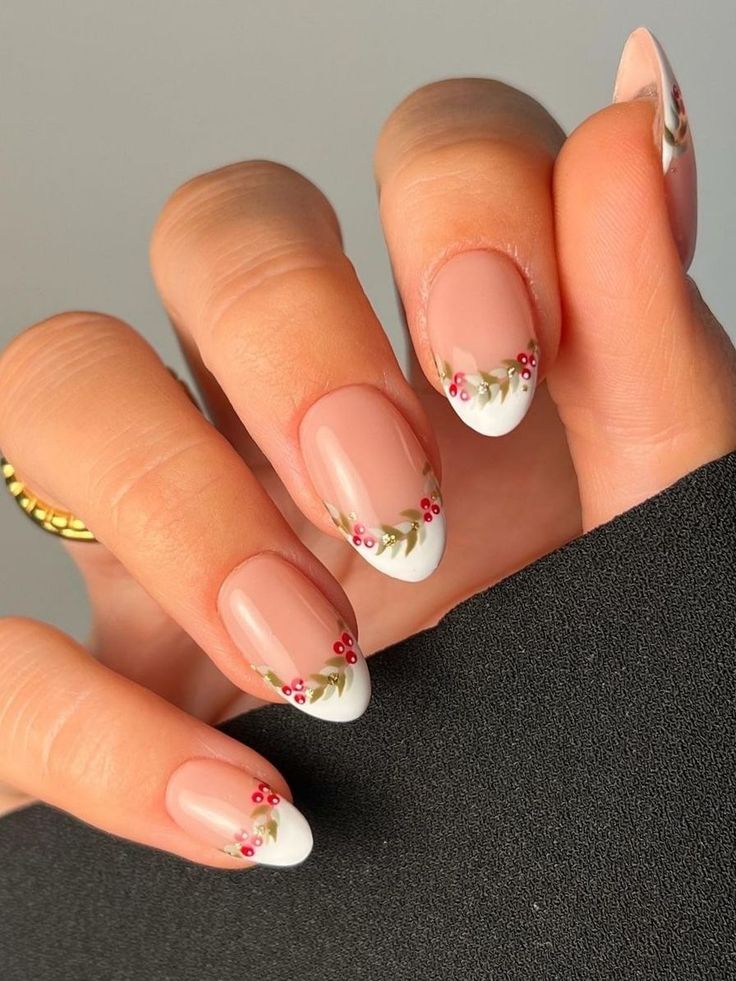 Charming Floral-Inspired Nail Design with Soft Nude Base and Delicate Tips.