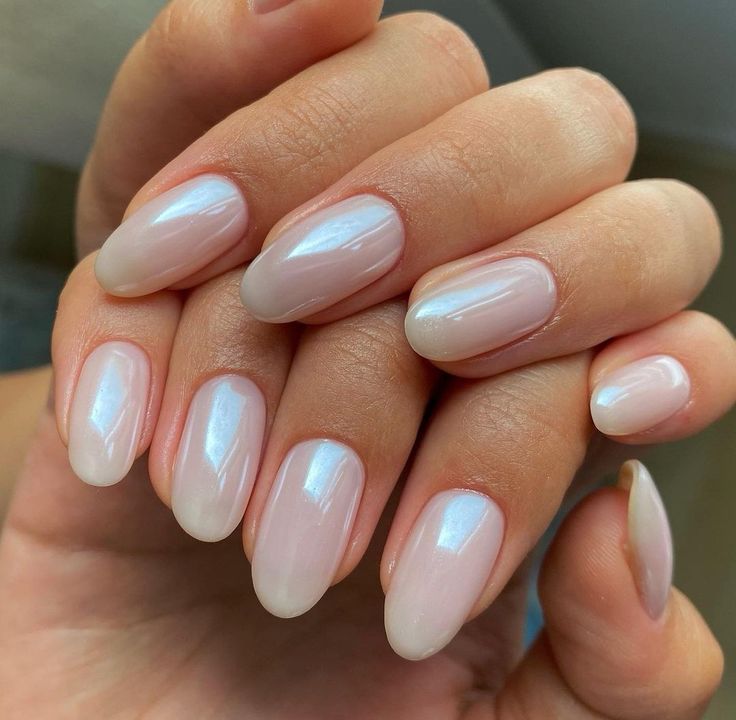 Elegant Ombre Nail Design in Soft Nude and Translucent Tones.