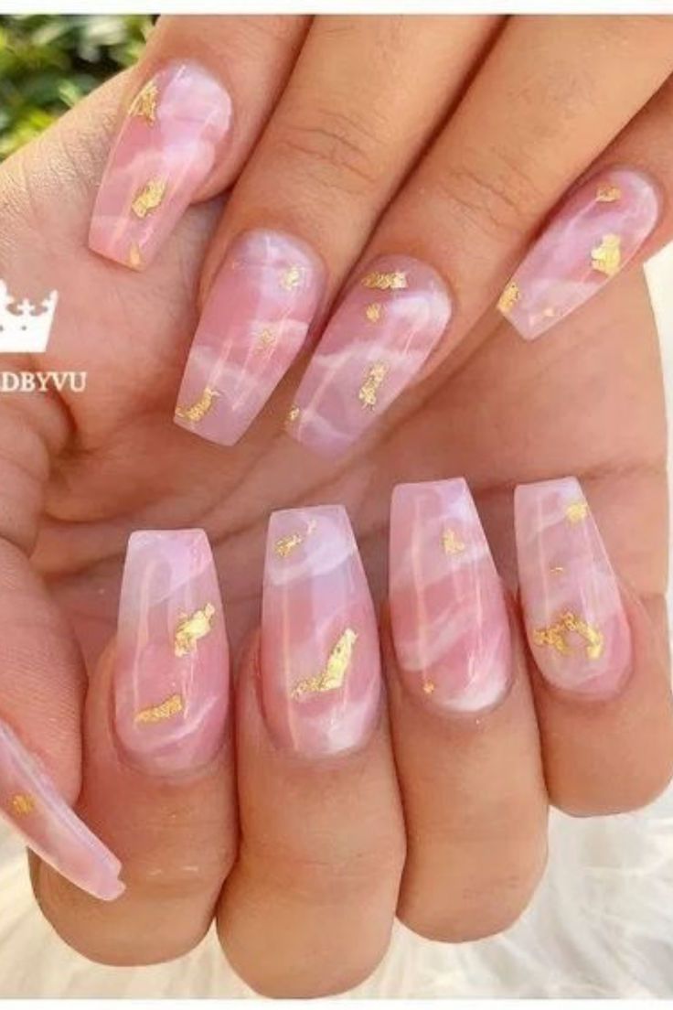 Elegant Pink Marble Nail Design with Gold Accents for All Occasions