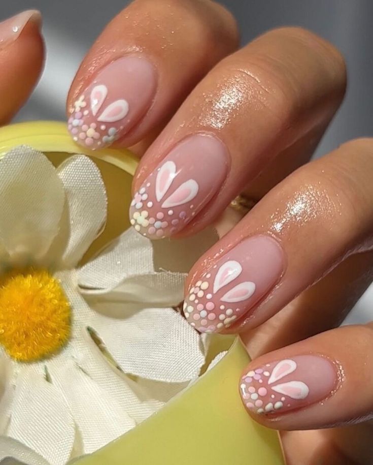 Whimsical Pastel Floral Nail Design with Charming Gradient Patterns.