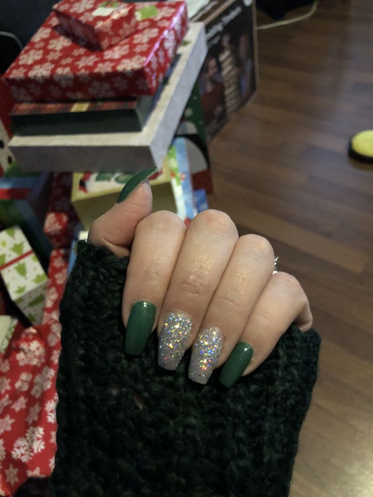 Elegant Holiday Nail Design: Deep Green with Glittery Silver and Holographic Accents