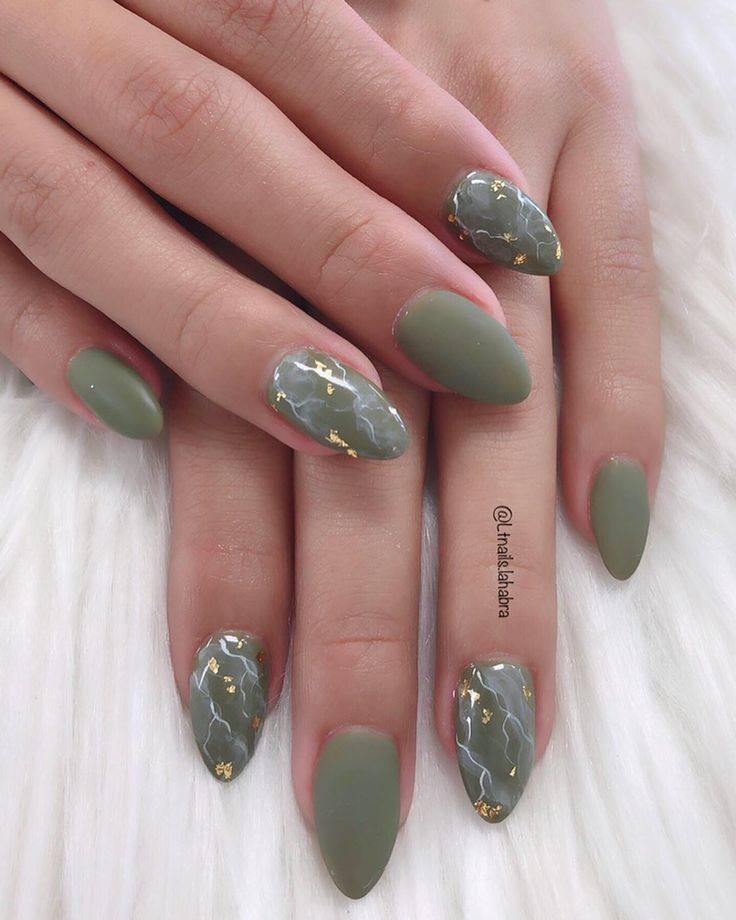 Sophisticated Olive Green Nail Design with Marble Patterns and Gold Accents.