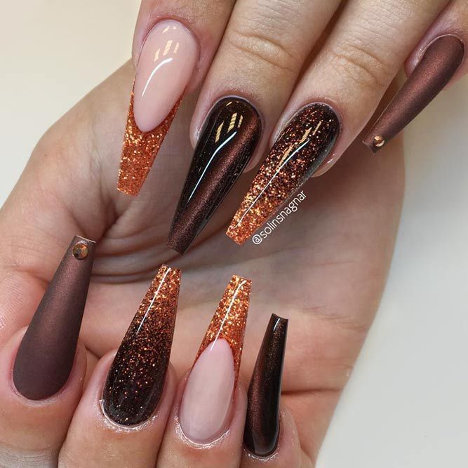 Elegant Long Nails with Deep Brown and Warm Peach Tones Accented by Copper Glitter and Modern Geometric Shapes.