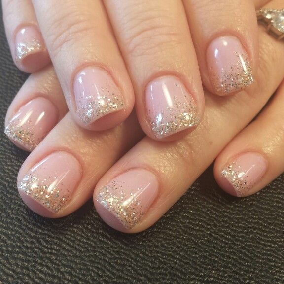 Elegant Soft Pink Nails with Delicate Glitter Gradient for Chic Occasions.