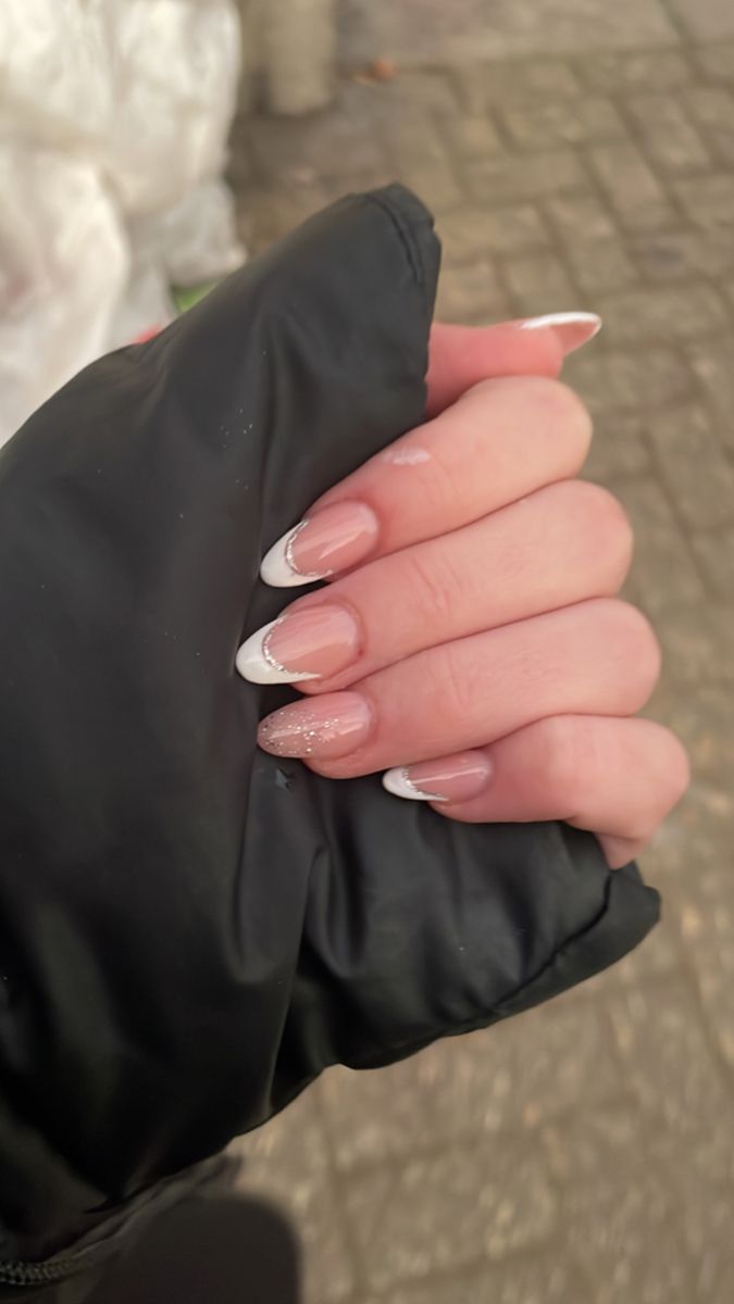 Chic and Timeless: Elegant French Manicure with Glitter Accents