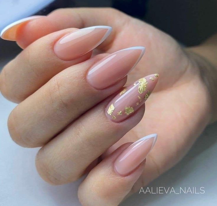 Sophisticated Almond-Shaped Nails with Glossy Nude Base and Glamorous Gold Foil Accent.