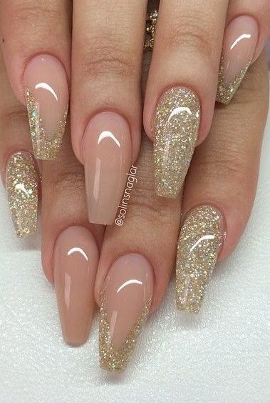 Sophisticated Stiletto Nails with Chic Nude and Glitter Gradient Design