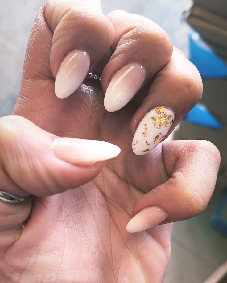 Chic Almond-Shaped Nail Design in Soft Pink and White with Glamorous Gold Flakes