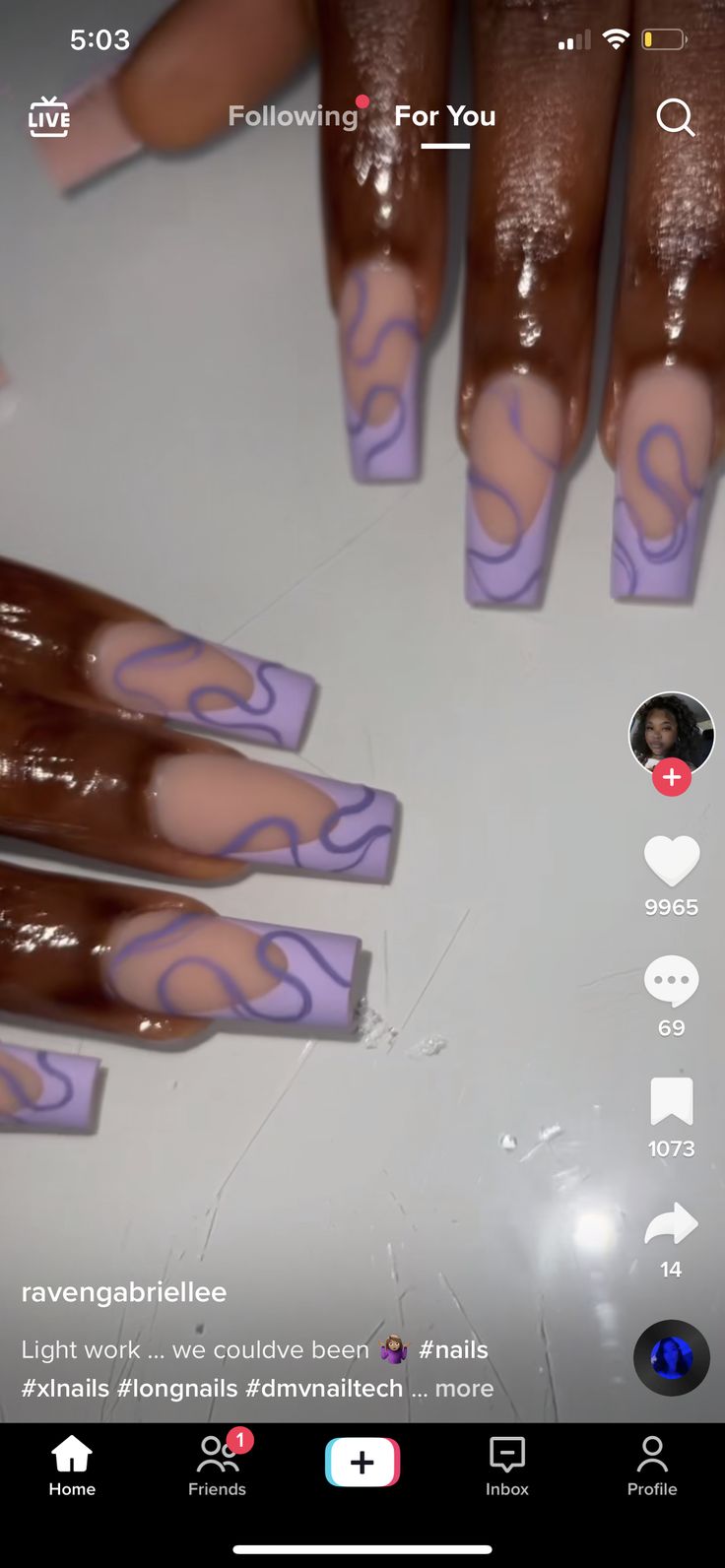 Trendy Long Nails: Elegant Nude Base with Artistic Purple Swirls