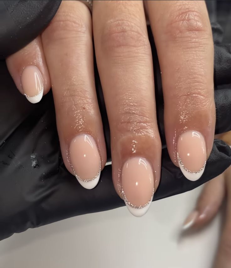 Elegant Nude Base with Classic French Tips and Glamorous Silver Detailing