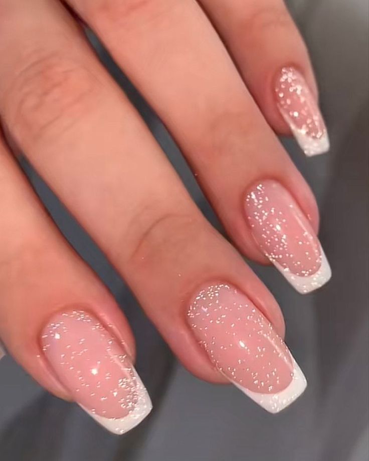 Chic French Manicure with Glamorous Glitter Tips