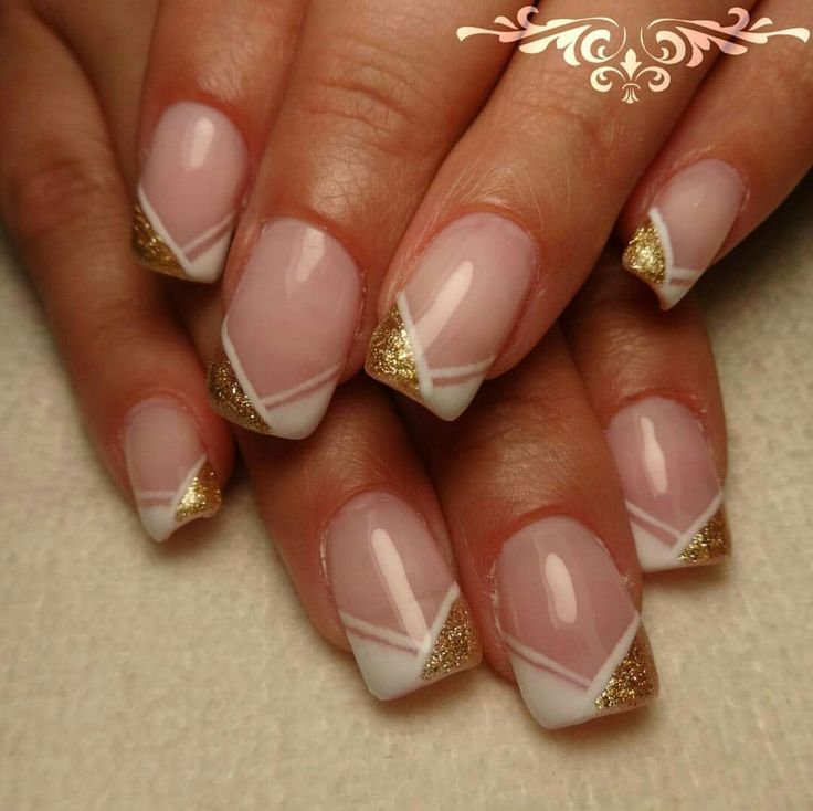 Chic Pink and White French Tip Nail Design with Gold Glitter Accents