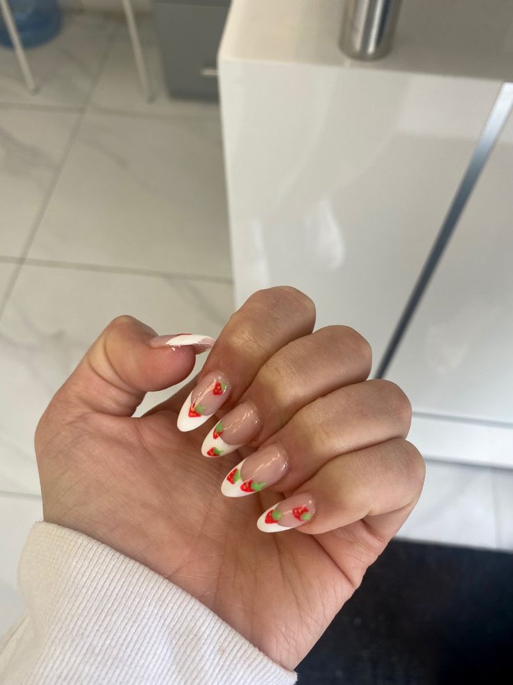 Chic Floral Almond Nail Design with White Tips for a Fresh Spring Look